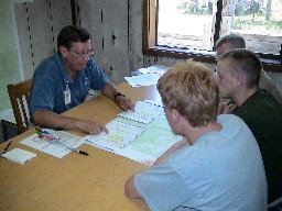 A Trek Planner reviews our intinerary with our crew leaders in Logisitics